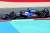 BWT Alpine F1® car on the race track. Castrol sponsorship logo features on the car.