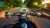 Front view look at fast moving motorcycle on the road