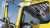 Yellow commercial truck and driver