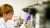 Female technician analysing samples