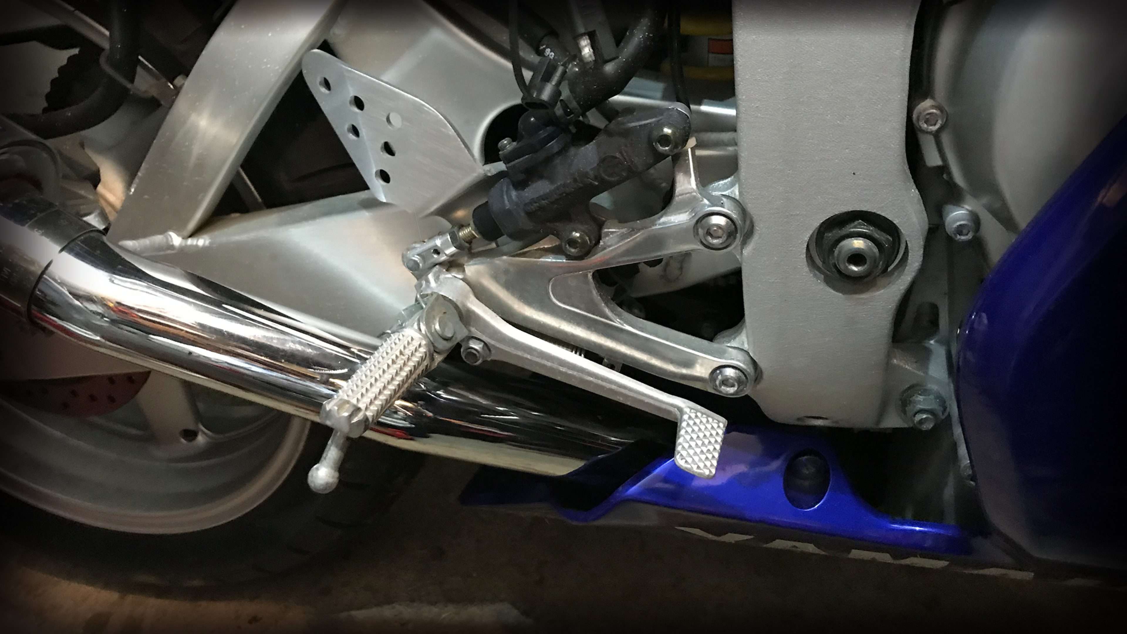 CHECKING MOTORCYCLE OIL WITH A DIPSTICK MOTORCYCLE OIL & FLUIDS Home